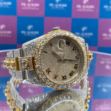 side angle view of luxury two tone iced out diamond watch from pragalbh jewels with round bezel