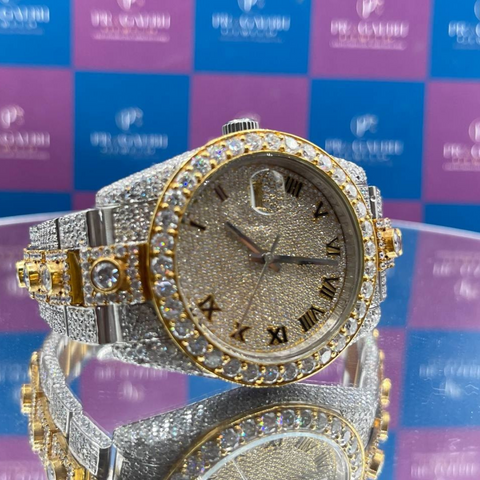 side angle view of luxury two tone iced out diamond watch from pragalbh jewels with round bezel